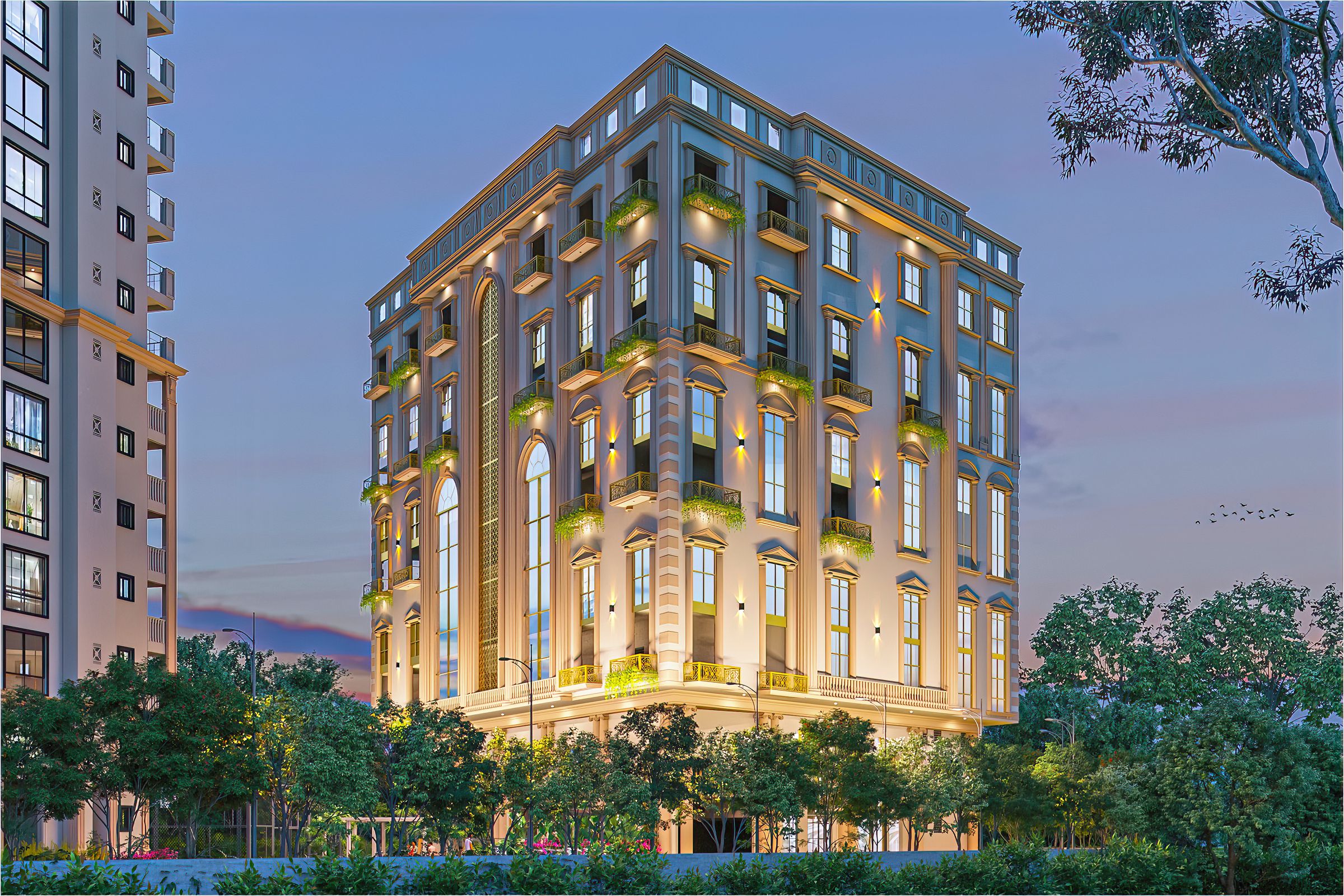 The 50,000 sq ft Vasavi Skyla clubhouse illuminated at dusk